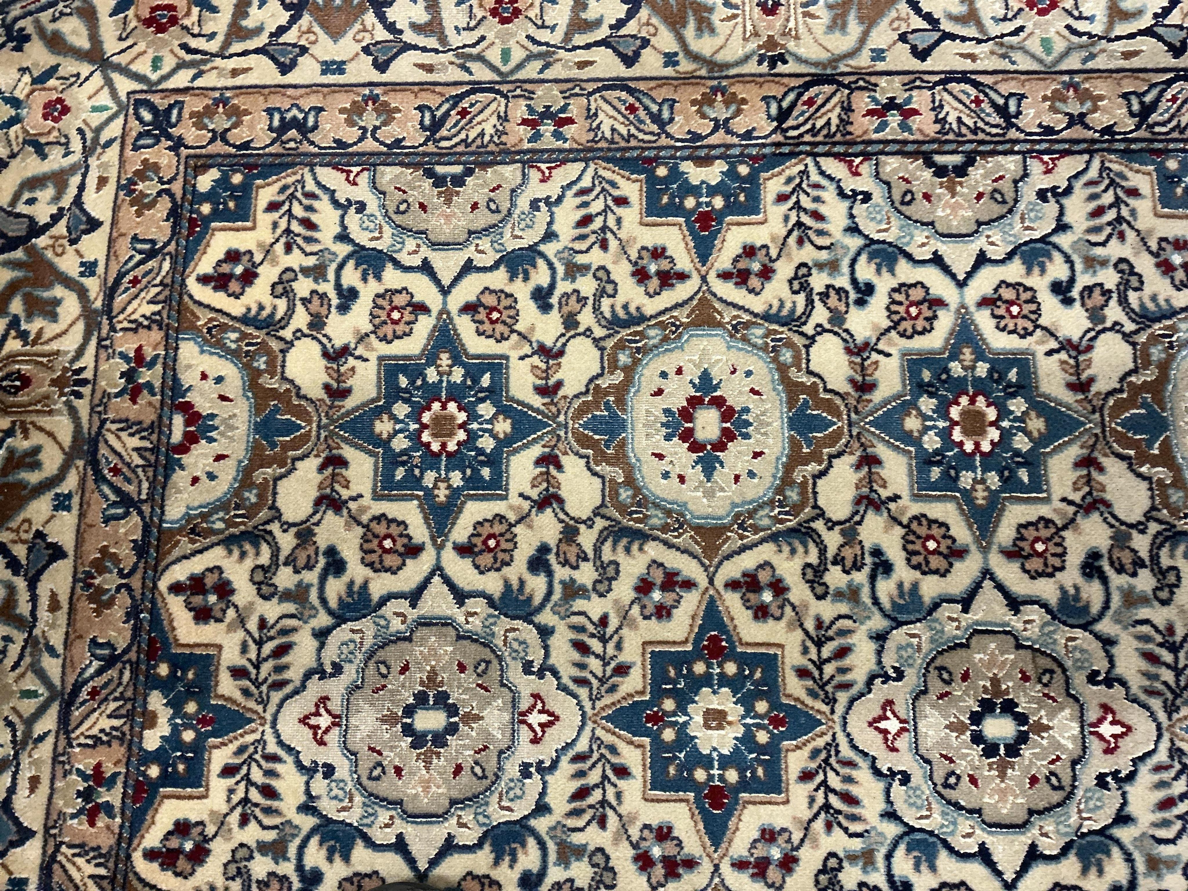 A Nain ivory ground carpet, 267 x 165cm